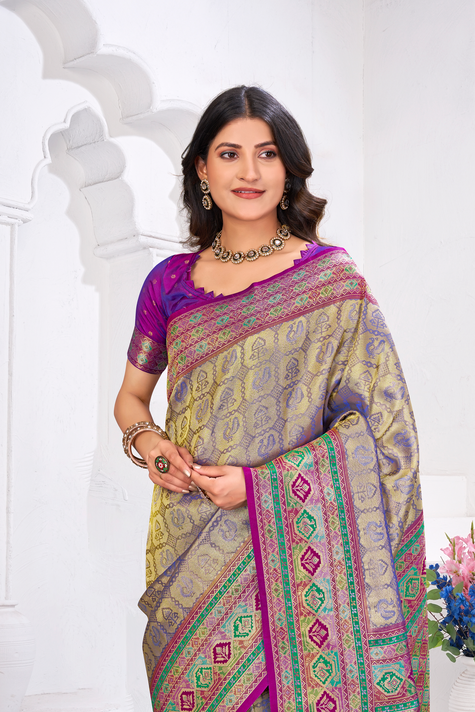 Rani Pink Meenakari Kanjivaram Silk Saree with Patola-Inspired Pallu and Blue Tassels