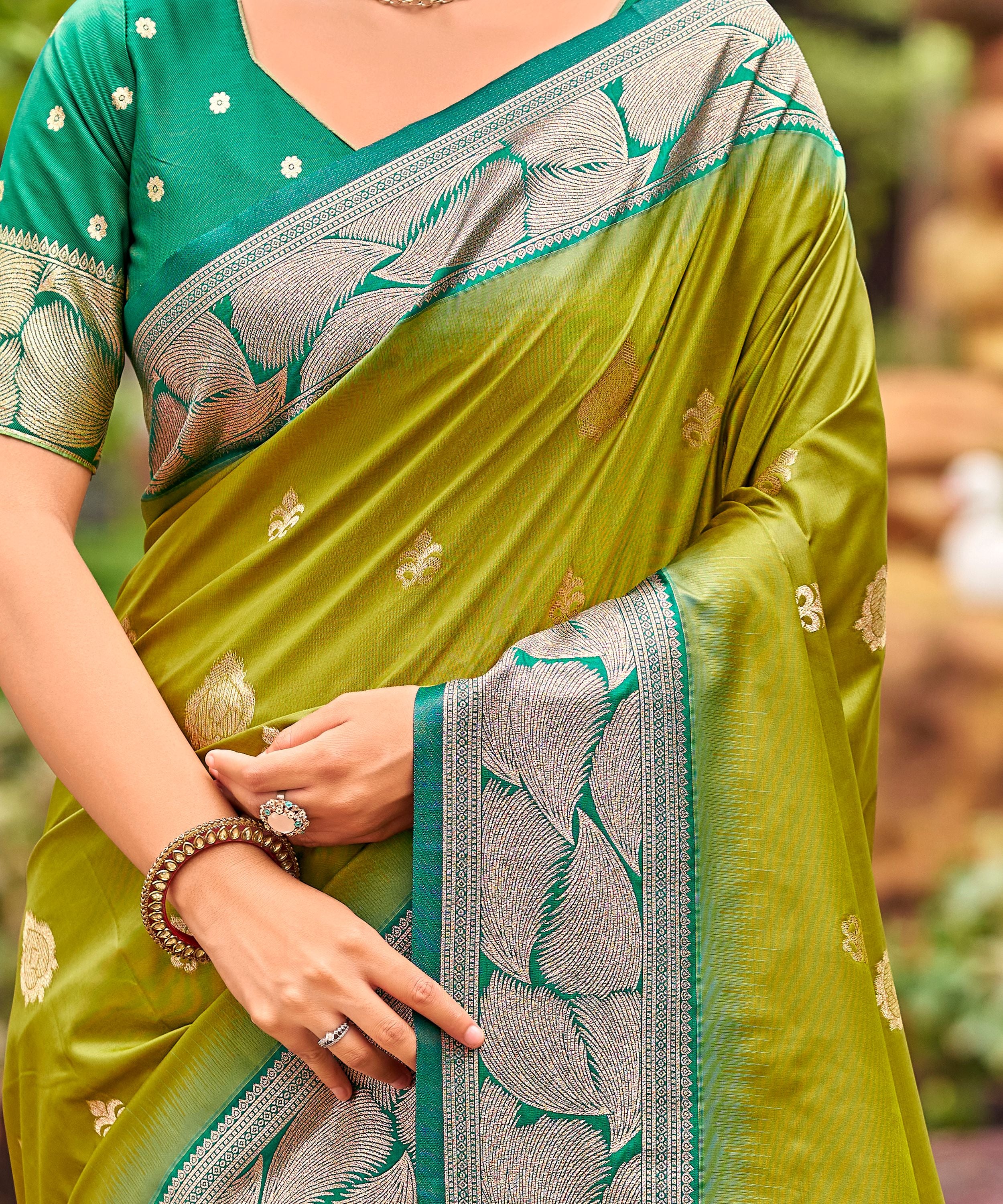 Olive Green Banarasi Soft Silk Saree with Silver Teal Border