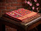 Cream Golden Patola Tissue Saree with Maroon Multicolour Border